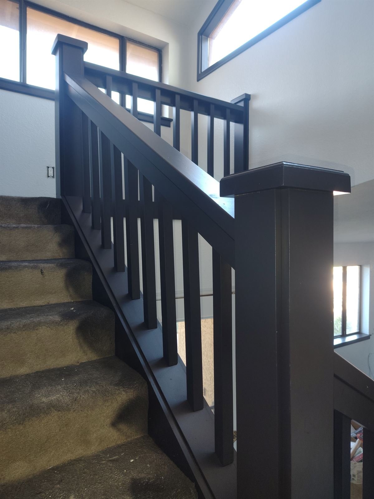 Black painted stair banister detail
